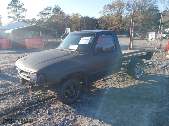 1997 Mazda B-Series 2WD Truck with VIN 4F4CR12A6VTM06442, listed as a IAAI auction lot 41229989 with NaN miles. Bid and sale history available at carsss.com. Image 2.