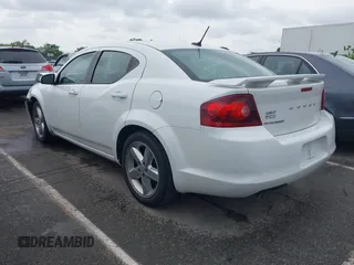 2013 Dodge Avenger SXT with VIN 1C3CDZCG9DN772959, listed as a IAAI auction lot 41971187 with 121,530 mi miles and . Bid and sale history available at carsss.com. Image 3.