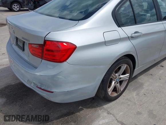 2013 BMW 3 Series 328i with VIN WBA3C1C59DK105001, listed as a IAAI auction lot 41923155 with 73,810 mi miles. Bid and sale history available at carsss.com. Image 4.