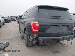 2021 Ford Expedition XL with VIN 1FMJU1FT5MEA84000, listed as a IAAI auction lot 41273172 with 77,049 mi miles. Bid and sale history available at carsss.com. Image 3.