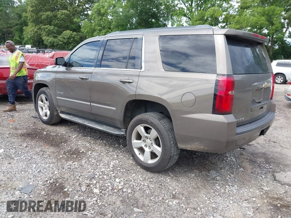 2015 Chevrolet Tahoe LT with VIN 1GNSCBKC5FR585138, listed as a IAAI auction lot 42420496 with 177,104 mi miles and . Bid and sale history available at DreamBid. Image 3.