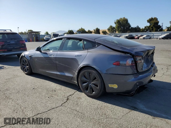 2022 Tesla Model S z VIN 5YJSA1E53NF462884, wystawiony jako Copart lot #62701915 z przebiegiem Nie podano mil oraz Szkoda całkowita • Salvage title. Historia ofert i sprzedaży dostępna na DreamBid. Obrazek 2.