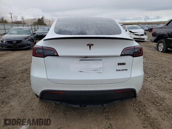 2024 Tesla Model Y Long Range with VIN 7SAYGAEE1RF061318, listed as a Copart auction lot 81142444 with 3,249 mi miles and Salvage Title. Bid and sale history available at DreamBid. Image 6.