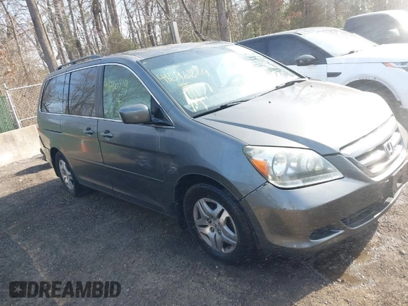 2007 Honda Odyssey EX-L z VIN 5FNRL38717B070328, wystawiony jako IAAI lot #41696829 z przebiegiem 171 229 mil mil oraz . Historia ofert i sprzedaży dostępna na DreamBid. Obrazek 1.