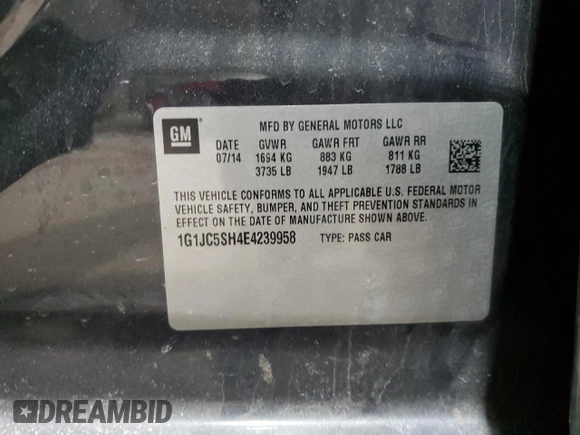 2014 Chevrolet Sonic LT with VIN 1G1JC5SH4E4239958, listed as a Copart auction lot 46082295 with 128,275 mi miles and Salvage Title. Bid and sale history available at DreamBid. Image 12.