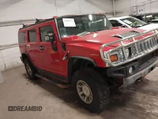 2004 Hummer H2 with VIN 5GRGN23U24H114730, listed as a IAAI auction lot 41605451 with 122,658 mi miles. Bid and sale history available at carsss.com. Image 1.