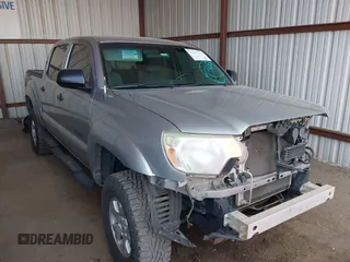 2014 Toyota Tacoma with VIN 3TMLU4EN3EM162738, listed as a IAAI auction lot 41871226 with 135,318 mi miles and . Bid and sale history available at DreamBid. Image 1.