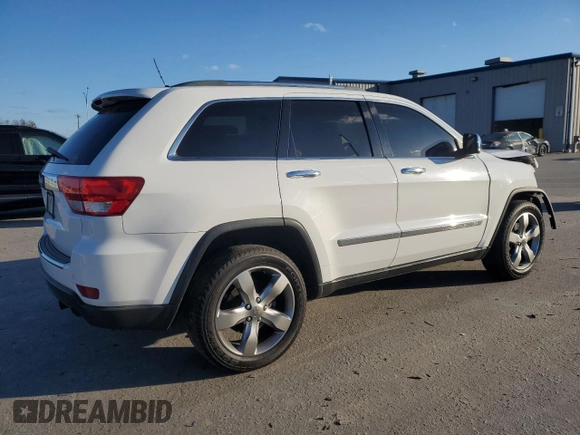 2013 Jeep Grand Cherokee Overland with VIN 1C4RJECG9DC644823, listed as a Copart auction lot 83232414 with 193,205 mi miles and Salvage Title. Bid and sale history available at carsss.com. Image 3.