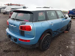 2017 MINI Clubman Cooper z VIN WMWLN5C56H2E32370, wystawiony jako IAAI lot #42159911 z przebiegiem 134 375 mil mil oraz . Historia ofert i sprzedaży dostępna na DreamBid. Obrazek 4.