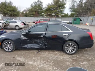 2016 Cadillac CTS Luxury Collection AWD with VIN 1G6AX5SS9G0194228, listed as a IAAI auction lot 41504476 with 94,573 mi miles and . Bid and sale history available at DreamBid. Image 13.