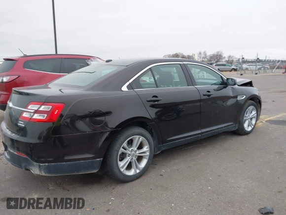 2014 Ford Taurus SEL z VIN 1FAHP2E85EG121636, wystawiony jako IAAI lot #41036886 z przebiegiem 117 460 mil mil oraz . Historia ofert i sprzedaży dostępna na DreamBid. Obrazek 4.