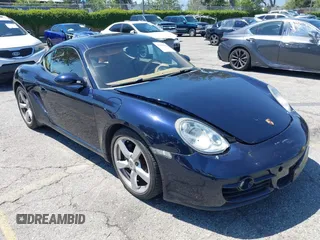 2007 Porsche 718 Cayman z VIN WP0AA29837U762585, wystawiony jako IAAI lot #42201028 z przebiegiem 58 563 mil mil oraz . Historia ofert i sprzedaży dostępna na DreamBid. Obrazek 1.