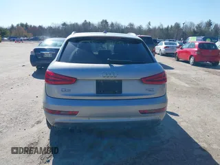 2015 Audi Q3 2.0T Premium Plus with VIN WA1EFCFSXFR010015, listed as a IAAI auction lot 42099410 with 142,117 mi miles. Bid and sale history available at carsss.com. Image 16.