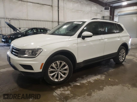 2018 Volkswagen Tiguan S with VIN 3VV1B7AX4JM118670, listed as a Copart auction lot 57055935 with 104,443 mi miles and Salvage title. Bid and sale history available at DreamBid. Image 1.
