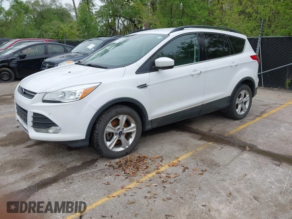 2016 Ford Escape SE with VIN 1FMCU9GX1GUC04085, listed as a IAAI auction lot 42126826 with 130,728 mi miles. Bid and sale history available at carsss.com. Image 2.