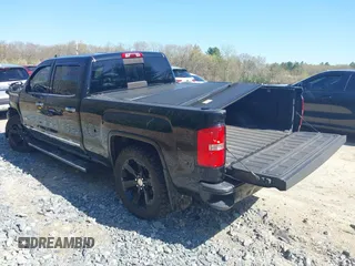 2015 GMC Sierra 1500 SLT with VIN 3GTU2VEJ8FG318480, listed as a IAAI auction lot 42075388 with 143,156 mi miles and . Bid and sale history available at DreamBid. Image 3.