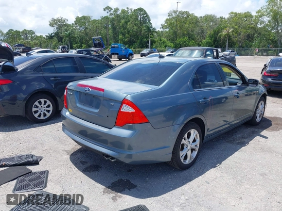 2012 Ford Fusion SE with VIN 3FAHP0HA7CR272566, listed as a IAAI auction lot 42539791 with 193,417 mi miles and . Bid and sale history available at DreamBid. Image 4.