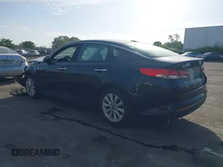 2016 Kia Optima EX with VIN 5XXGU4L3XGG033323, listed as a IAAI auction lot 42088998 with 134,686 mi miles and . Bid and sale history available at carsss.com. Image 3.