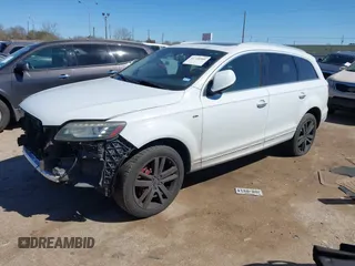 2014 Audi Q7 3.0T Premium Plus with VIN WA1LGAFEXED000843, listed as a IAAI auction lot 41728585 with 169,033 mi miles. Bid and sale history available at carsss.com. Image 2.