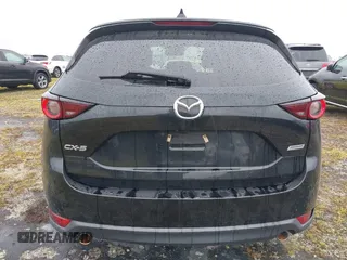 2018 Mazda CX-5 Touring with VIN JM3KFACM0J0315739, listed as a IAAI auction lot 40516262 with 60,727 mi miles. Bid and sale history available at carsss.com. Image 16.