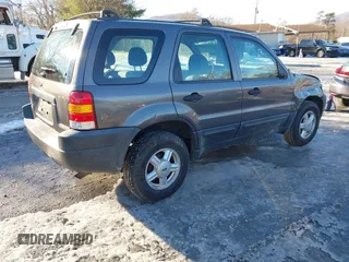2003 Ford Escape XLS Popular with VIN 1FMYU02103KE02490, listed as a IAAI auction lot 41326202 with 190,280 mi miles and . Bid and sale history available at DreamBid. Image 4.