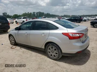 2012 Ford Focus SE with VIN 1FAHP3F29CL287498, listed as a Copart auction lot 61476855 with 139,801 mi miles and Salvage title. Bid and sale history available at DreamBid. Image 2.