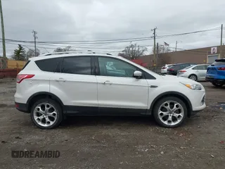2013 Ford Escape Titanium with VIN 1FMCU0J96DUD85315, listed as a IAAI auction lot 41934204 with 152,132 mi miles and . Bid and sale history available at carsss.com. Image 13.