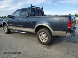 2001 Ford F-150 XL with VIN 1FTRX18L01NA29591, listed as a Copart auction lot 50591035 with 250,345 mi miles and Salvage Title. Bid and sale history available at carsss.com. Image 2.
