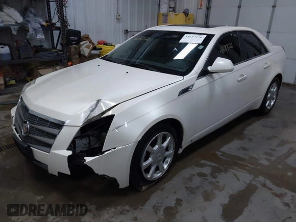 2009 Cadillac CTS AWD with VIN 1G6DH577490134942, listed as a IAAI auction lot 41683126 with 120,079 mi miles and . Bid and sale history available at DreamBid. Image 2.