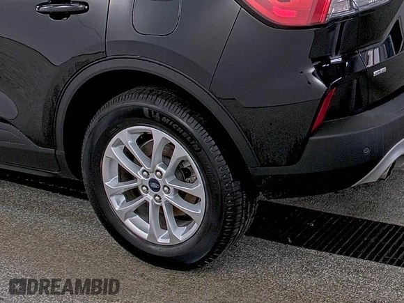 2021 Ford Escape SE with VIN 1FMCU9G64MUA42925, listed as a IAAI auction lot 42858756 with 79,685 mi miles and . Bid and sale history available at DreamBid. Image 6.