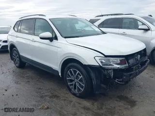 2021 Volkswagen Tiguan S with VIN 3VV1B7AX5MM045667, listed as a IAAI auction lot 41256945 with 90,523 mi miles. Bid and sale history available at carsss.com. Image 1.
