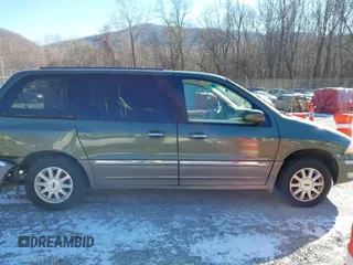 2002 Ford Windstar LTD z VIN 2FMDA58482BB51930, wystawiony jako IAAI lot #41348875 z przebiegiem 92 377 mil mil oraz . Historia ofert i sprzedaży dostępna na DreamBid. Obrazek 13.