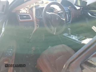 2016 Maserati Ghibli z VIN ZAM57XSA3G1167081, wystawiony jako Copart lot #49139785 z przebiegiem Nie podano mil oraz Czysty tytuł • Clean title. Historia ofert i sprzedaży dostępna na DreamBid. Obrazek 8.
