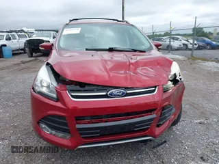 2013 Ford Escape Titanium with VIN 1FMCU9J94DUC07522, listed as a IAAI auction lot 42365124 with 61,168 mi miles and . Bid and sale history available at DreamBid. Image 12.