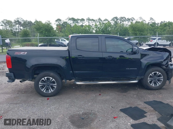 2021 Chevrolet Colorado 4WD Z71 with VIN 1GCGTDEN5M1190797, listed as a IAAI auction lot 42473079 with 77,290 mi miles and . Bid and sale history available at DreamBid. Image 13.