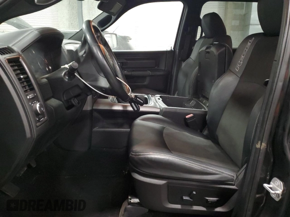 2018 Ram 1500 Rebel with VIN 1C6RR7YT8JS180068, listed as a Copart auction lot 44908605 with 123,408 mi miles and Salvage Title. Bid and sale history available at carsss.com. Image 7.