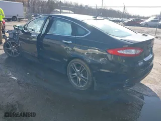 2014 Ford Fusion Titanium with VIN 3FA6P0K9XER119642, listed as a IAAI auction lot 41791340 with 150,777 mi miles. Bid and sale history available at carsss.com. Image 3.