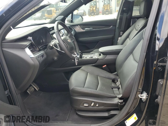 2024 Cadillac XT6 AWD Sport z VIN 1GYKPGRS6RZ749292, wystawiony jako Copart lot #50844795 z przebiegiem 12 972 mil mil oraz Szkoda całkowita • Salvage title. Historia ofert i sprzedaży dostępna na DreamBid. Obrazek 7.