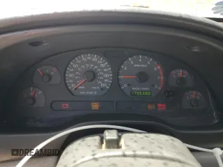 2001 Ford Mustang GT Deluxe z VIN 1FAFP42X61F165305, wystawiony jako Copart lot #53828935 z przebiegiem 175 538 mil mil oraz Szkoda całkowita • Salvage title. Historia ofert i sprzedaży dostępna na DreamBid. Obrazek 9.