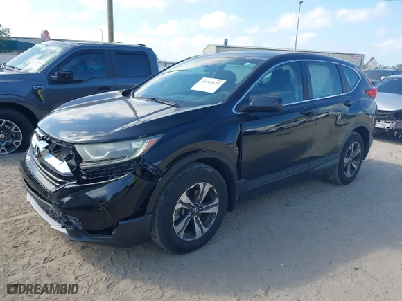 2017 Honda CR-V LX with VIN 7FARW5H33HE001050, listed as a IAAI auction lot 41944571 with 61,159 mi miles. Bid and sale history available at carsss.com. Image 2.