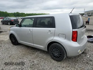 2009 Scion xB z VIN JTLKE50E591067708, wystawiony jako Copart lot #56297005 z przebiegiem 206 638 mil mil oraz Szkoda całkowita • Salvage title. Historia ofert i sprzedaży dostępna na DreamBid. Obrazek 2.
