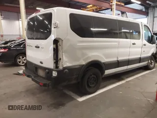 2019 Ford Transit Passenger XL with VIN 1FBZX2ZM8KKB24761, listed as a IAAI auction lot 40978107 with 153,669 mi miles. Bid and sale history available at carsss.com. Image 4.
