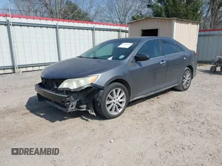 2012 Toyota Camry SE with VIN 4T1BK1FK2CU513986, listed as a IAAI auction lot 41538713 with 176,862 mi miles. Bid and sale history available at carsss.com. Image 2.