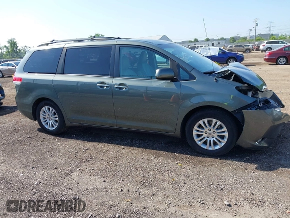 2014 Toyota Sienna XLE with VIN 5TDYK3DC6ES414892, listed as a IAAI auction lot 42545666 with 135,805 mi miles and . Bid and sale history available at DreamBid. Image 14.
