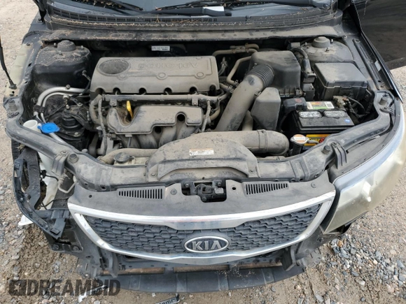 2012 Kia Forte EX with VIN KNAFU4A29C5597563, listed as a Copart auction lot 69807704 with 98,267 mi miles and Salvage Title. Bid and sale history available at carsss.com. Image 12.