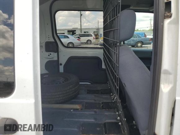 2012 Ford Transit Connect XL с VIN NM0LS6AN1CT122404, выставлен на аукционе Copart как лот 61028894 с пробегом 287 454 миль миль и Списание • Salvage title. История ставок и продаж доступна на DreamBid. Изображение 11.