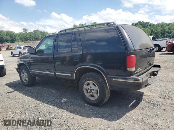 1998 Chevrolet Blazer LS with VIN 1GNDT13W6W2102082, listed as a Copart auction lot 61773115 with Not provided miles and Clean title. Bid and sale history available at DreamBid. Image 2.