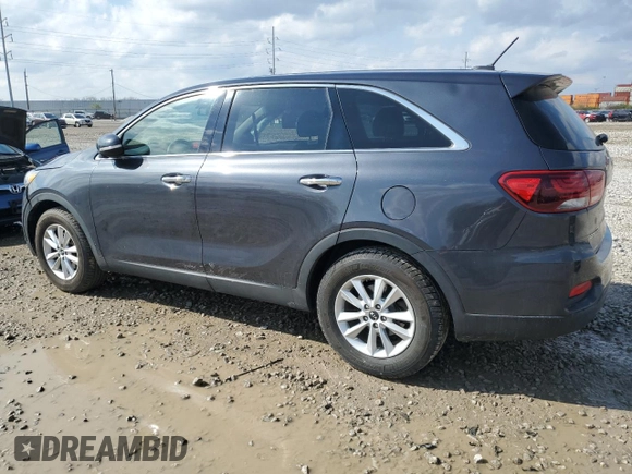 2019 Kia Sorento LX z VIN 5XYPG4A57KG486900, wystawiony jako Copart lot #52674115 z przebiegiem 105 259 mil mil oraz Szkoda całkowita • Salvage title. Historia ofert i sprzedaży dostępna na DreamBid. Obrazek 2.
