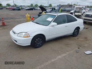 1997 Honda Civic EX z VIN 1HGEJ8143VL028501, wystawiony jako IAAI lot #42058395 z przebiegiem 129 401 mil mil oraz . Historia ofert i sprzedaży dostępna na DreamBid. Obrazek 2.