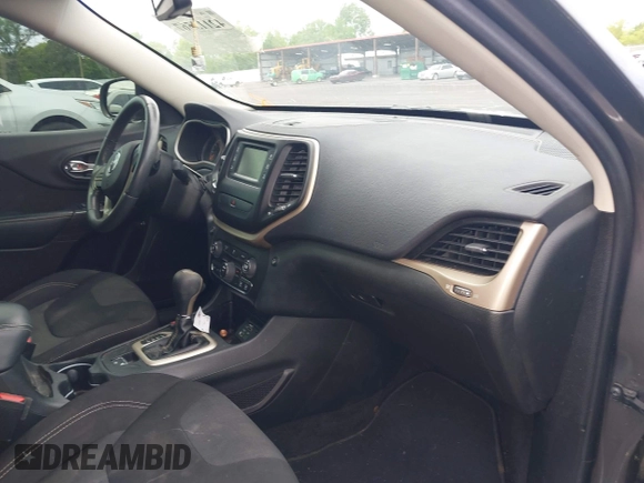 2015 Jeep Cherokee Latitude with VIN 1C4PJLCB5FW689811, listed as a IAAI auction lot 42113567 with 113,740 mi miles and . Bid and sale history available at carsss.com. Image 5.